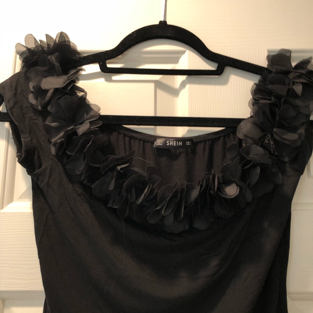 Black off- the- shoulder flower bodysuit